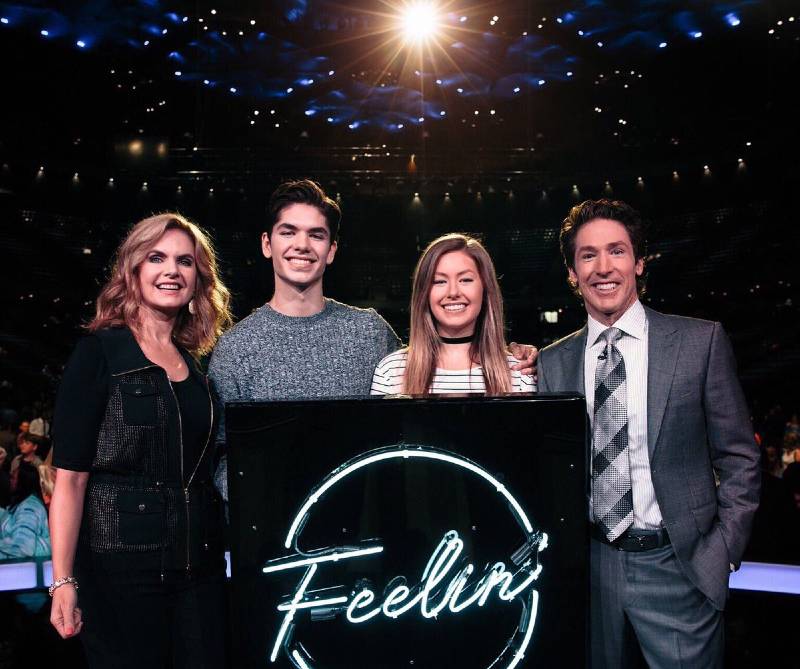 Jonathan Osteen at the stage with his parents