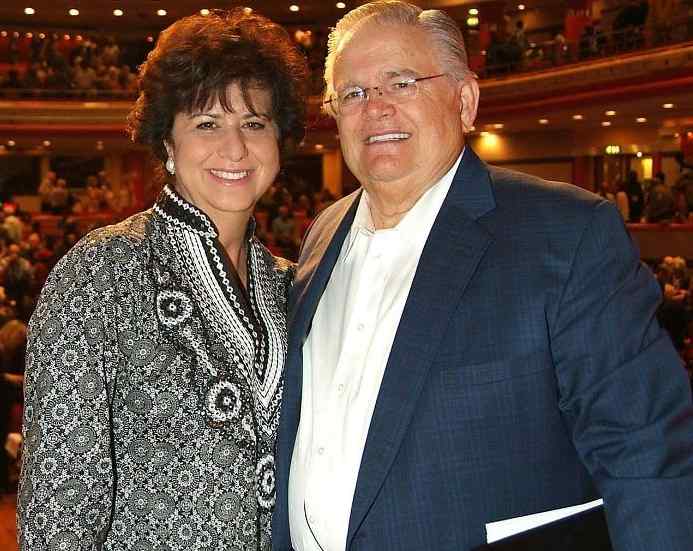John Hagee in white shirt with his wife, Diana