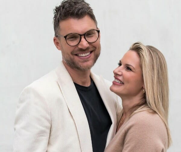 Pastor Judah Smith looking blessed with his wife, Chelsea