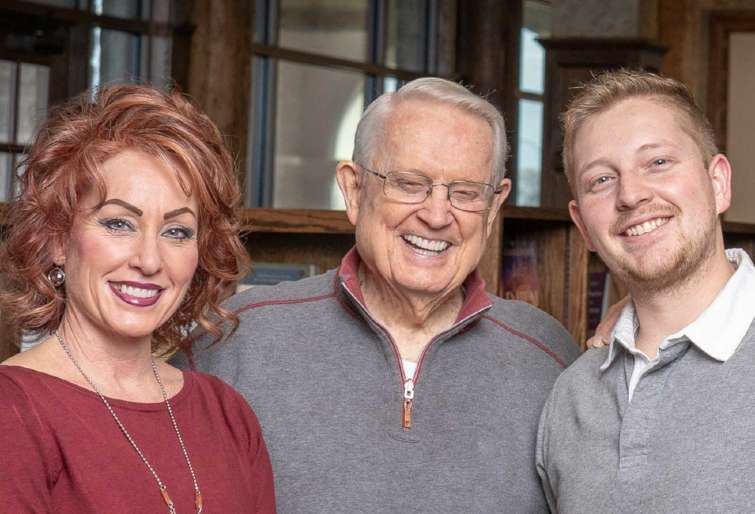 Chuck Swindoll looking happy with his children