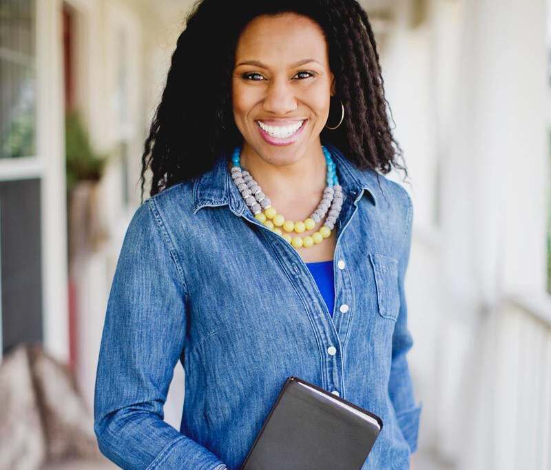 Priscilla Shirer smiling in deadlocked hair