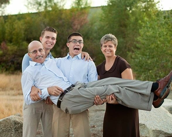 Doug Batchelor looking happy with his wife and sons